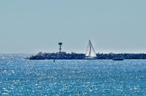 Jetty with sailboat