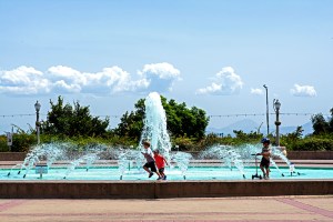 Kids playing at fountain